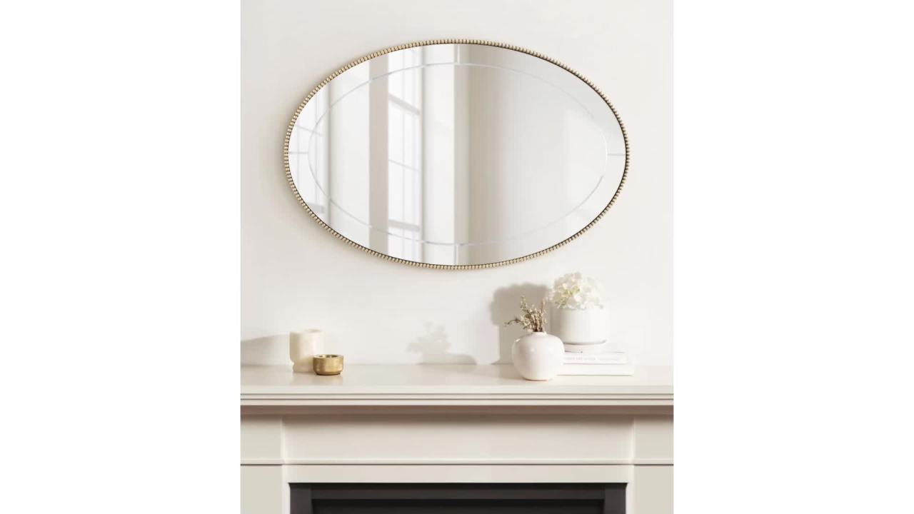 thumbnail video image 2 of Kate and Laurel Gwendolyn Antique Beaded Oval Wall Mirror, 24 x 36, Gold, Sophisticated Vintage Bathroom Mirror Wall Decor with Engraved Groove Detailing, 2 of 10