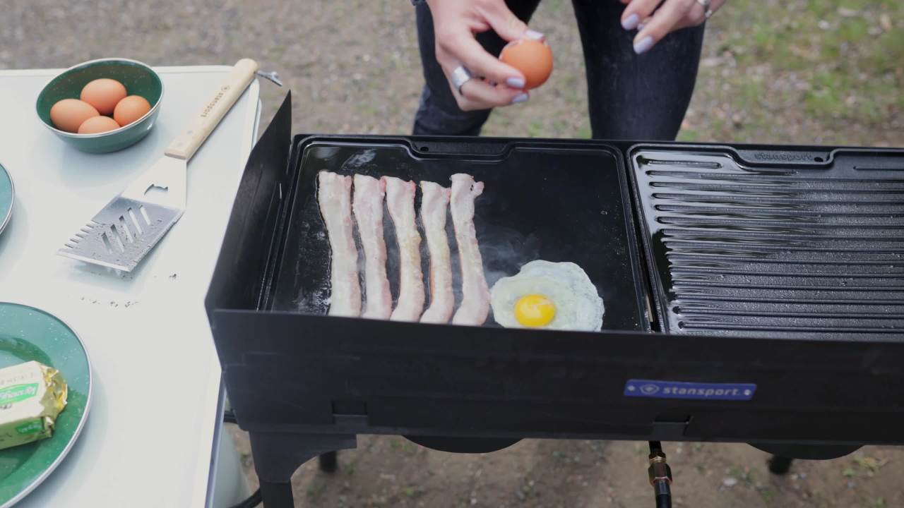 thumbnail video image 2 of Stansport Pre-Seasoned Cast Iron Griddle with Lid Lifting Hole  - 15" surface, 2 of 9