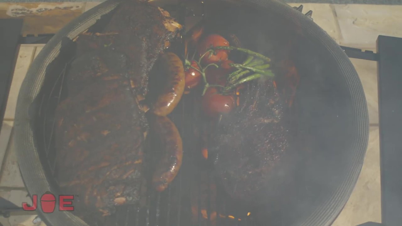 thumbnail video image 2 of Big Joe™ II 24-inch Charcoal Grill in Red with Cart, Side Shelves, Grill Gripper, and Ash Tool, 2 of 7