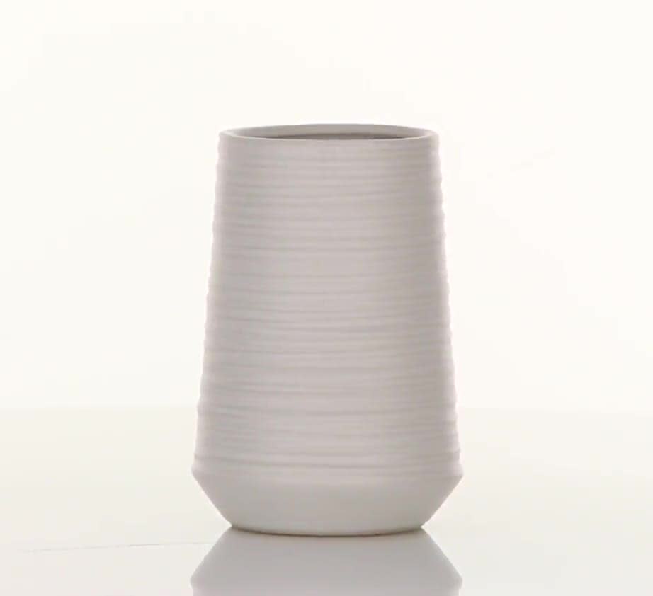 thumbnail video image 2 of CosmoLiving by Cosmopolitan 7" Ribbed White Porcelain Ceramic Vase, 2 of 8