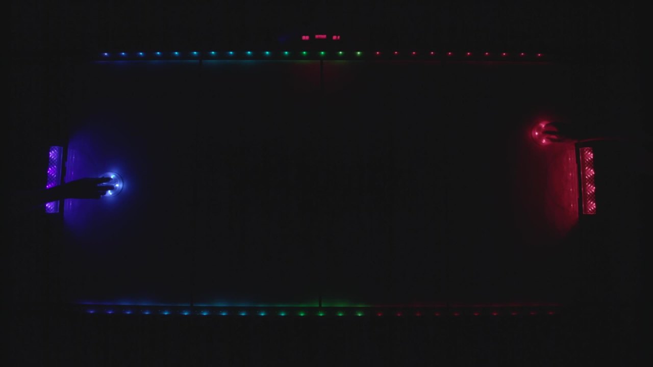 thumbnail video image 2 of Atomic Top Shelf LED Illuminated Air Hockey Table, Silver, 90", 2 of 17