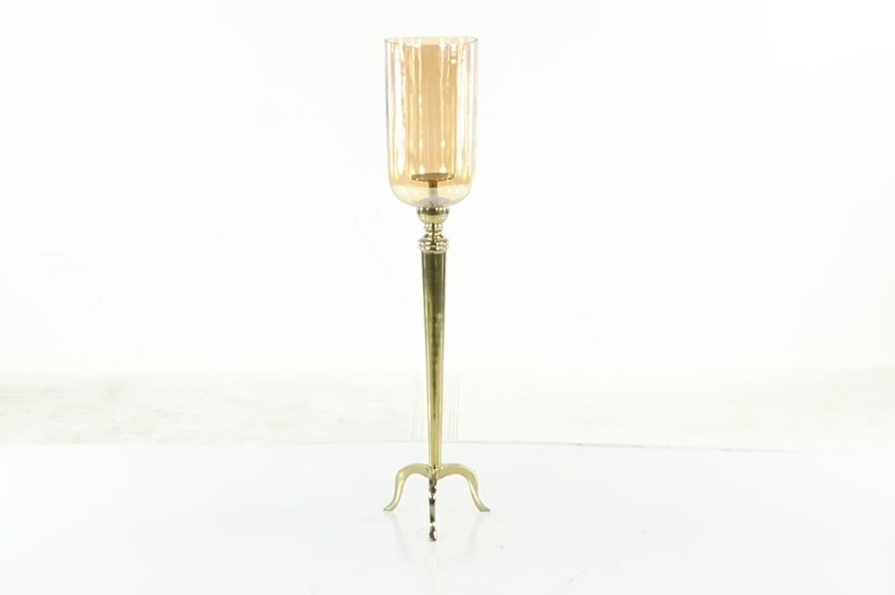 thumbnail video image 2 of DecMode Gold Aluminum Metal Tall Floor Hurricane Lamp with Iridescent Glass Holder and Scrolled Legs, 2 of 14