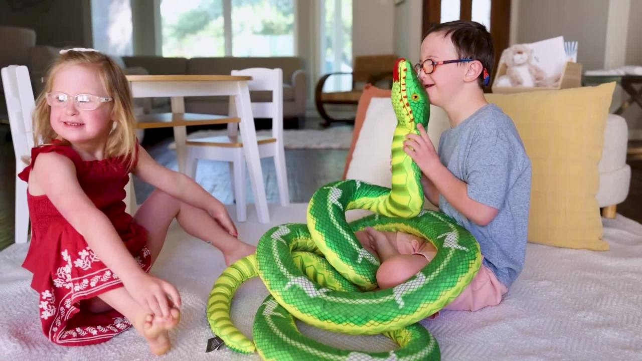 thumbnail video image 2 of Melissa & Doug Giant Boa Constrictor Snake Lifelike Plush Stuffed Animal (Over 14 Feet Long), 2 of 10