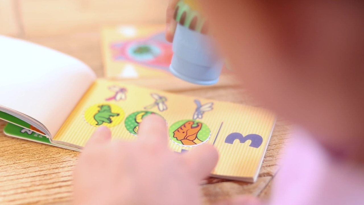 thumbnail video image 2 of Melissa & Doug Sticker WOW!™ Mini Activity Pad and 200+ Refill Stickers for Sticker Stamper Arts and Crafts Fidget Toy Collectibles – Dinosaur, 2 of 10
