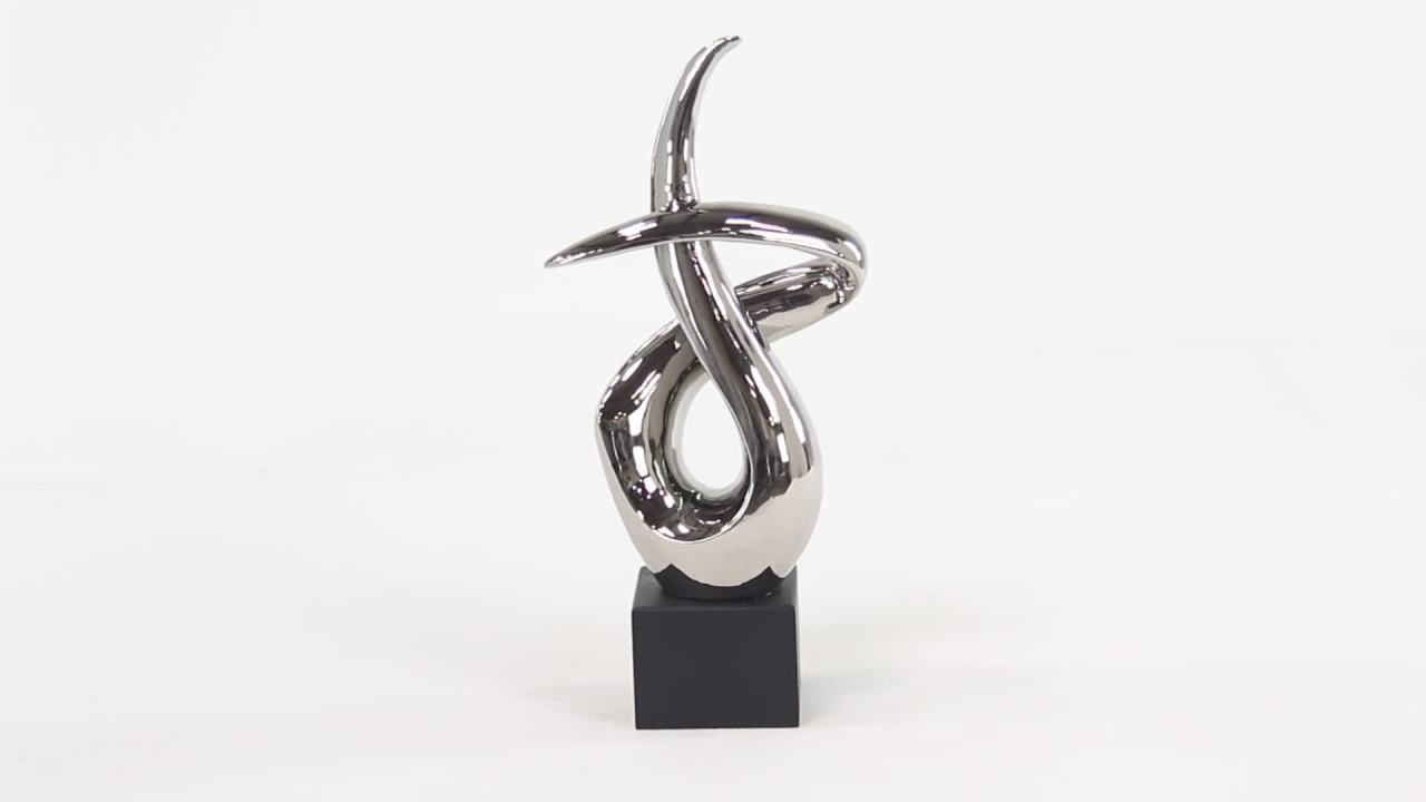 thumbnail video image 2 of 10" x 22" Silver Ceramic Swirl Abstract Sculpture with Black Base, by DecMode, 2 of 10