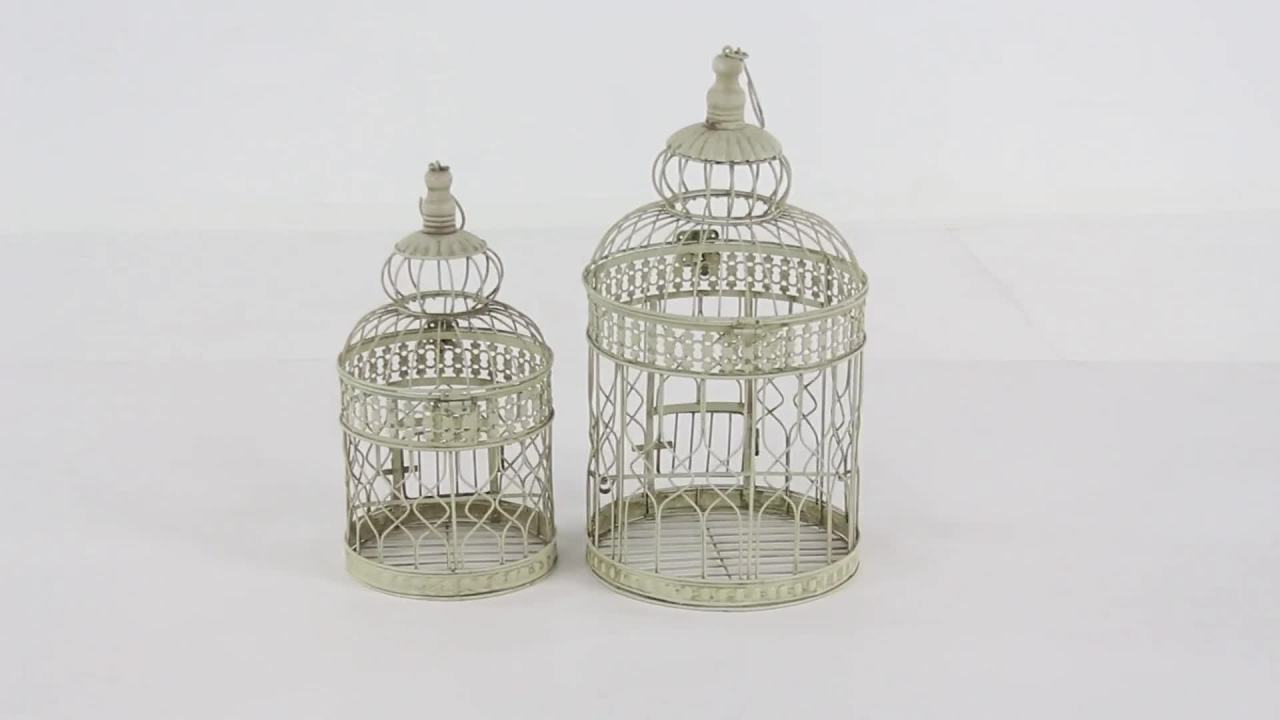 thumbnail video image 2 of DecMode Hinged Top Cream Metal Birdcage with Latch Lock Closure and Hanging Hook, Set of 2, 2 of 14