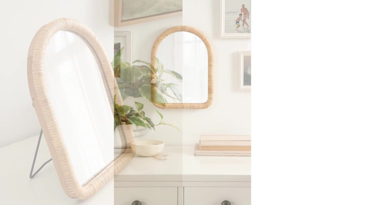 thumbnail video image 2 of Kate and Laurel Rahfy Boho Arched Rattan Tabletop Easel Mirror, 12 x 16, Natural Rattan, Coastal Small Tabletop Mirror for Use as Bedroom Makeup Mirror or Bathroom Vanity Mirror, 2 of 10