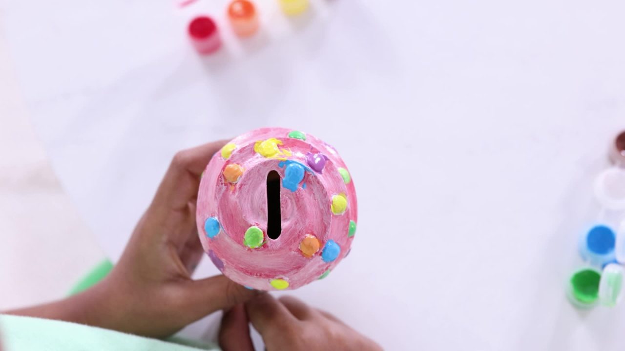 thumbnail video image 2 of Melissa & Doug Created by Me! Cupcake Bank Craft Kit With 8 Pots of Paint and Paintbrush, 2 of 10