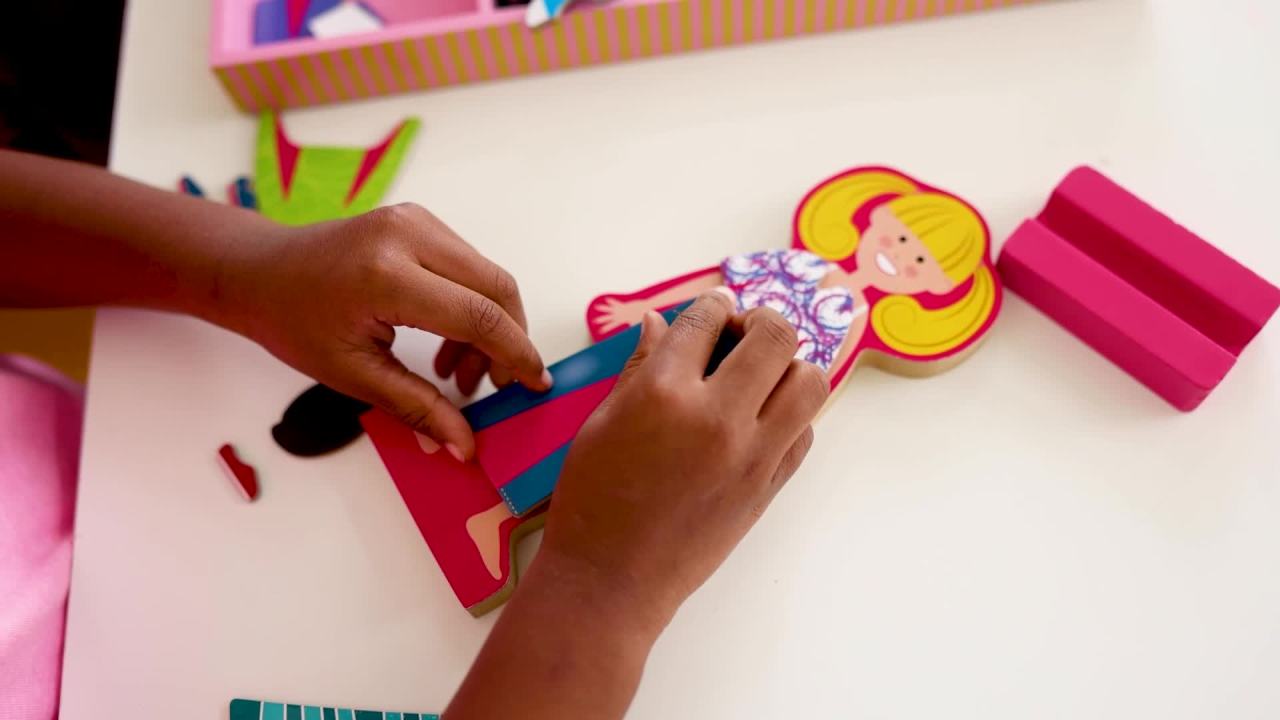 thumbnail video image 2 of Melissa & Doug Abby and Emma Deluxe Magnetic Wooden Dress-Up Dolls Play Set (55+ pcs), 2 of 10