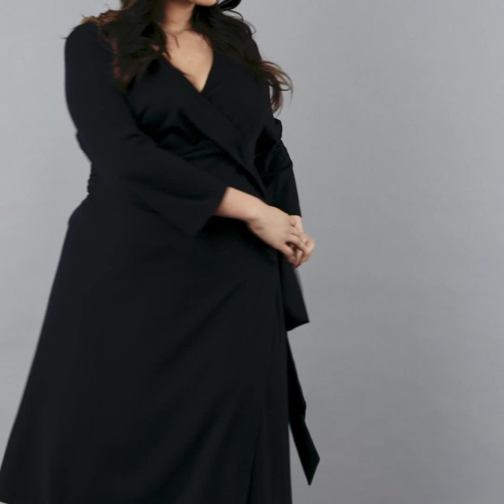 thumbnail video image 2 of Seek No Further Women’s Plus Size Ponte ¾ Sleeve V-Neck Wrap Dress, 2 of 9