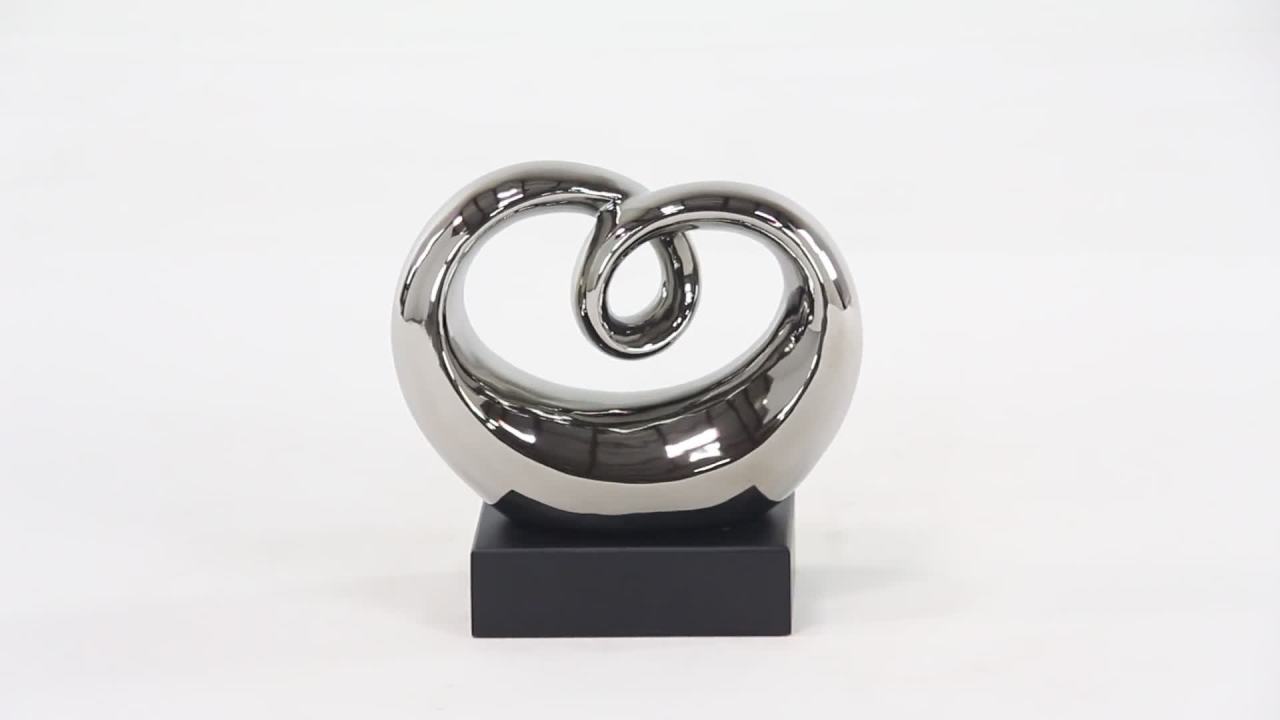 thumbnail video image 2 of 10" x 10" Silver Ceramic Swirl Abstract Sculpture with Black Base, by DecMode, 2 of 10