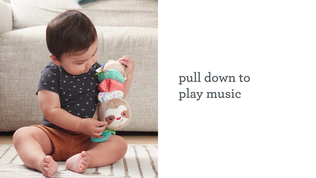 thumbnail video image 3 of Infantino Music & Motion Pulldown Sloth, Hanging-Style Plush Toy, 6-12 Months, 3 of 10