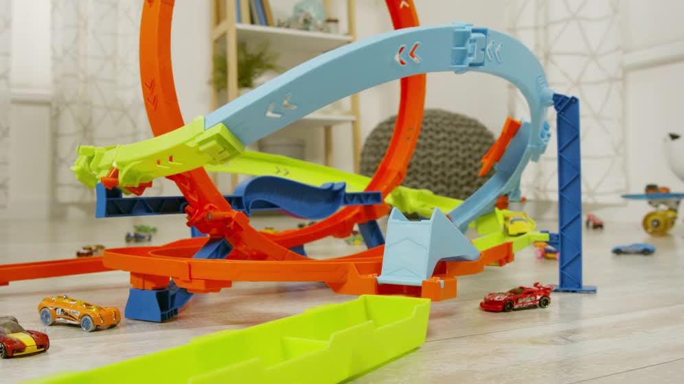 thumbnail video image 2 of Hot Wheels Action Loop Cyclone Challenge Track Set with 1:64 Scale Toy Car, Easy Storage, 2 of 7