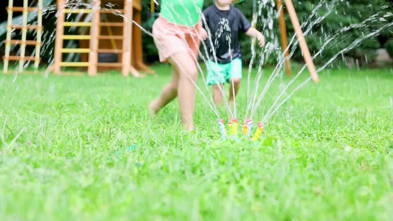 thumbnail video image 2 of Melissa & Doug Sunny Patch Splash Patrol Outdoor Sprinkler Toy with Hose Attachment, 2 of 10