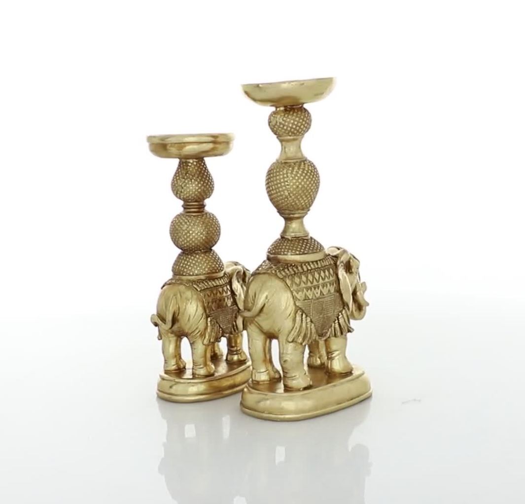 thumbnail video image 2 of DecMode 2 Candle Gold Polystone Elephant Candle Holder, Set of 2, 2 of 9