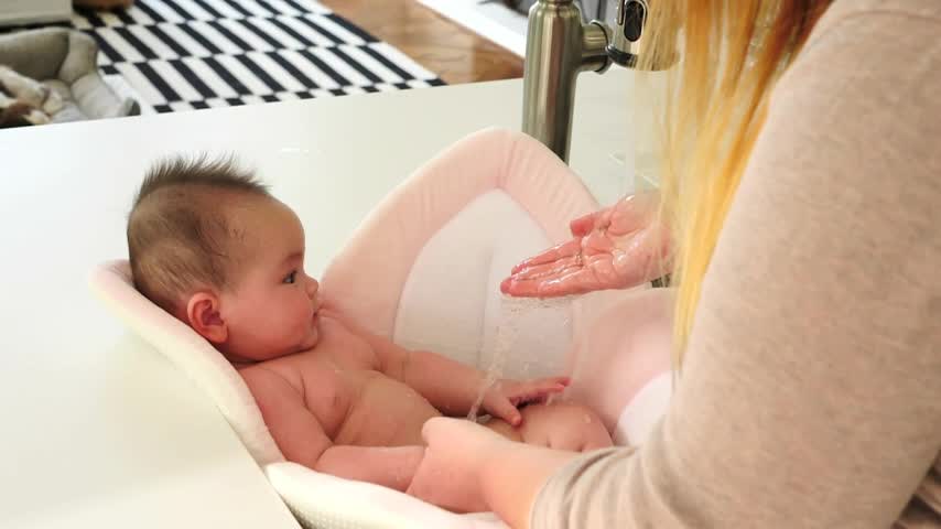 thumbnail video image 2 of Blooming Bath Lotus Baby Bath Seat - Sink Baby Bath Insert, Yellow, 2 of 6