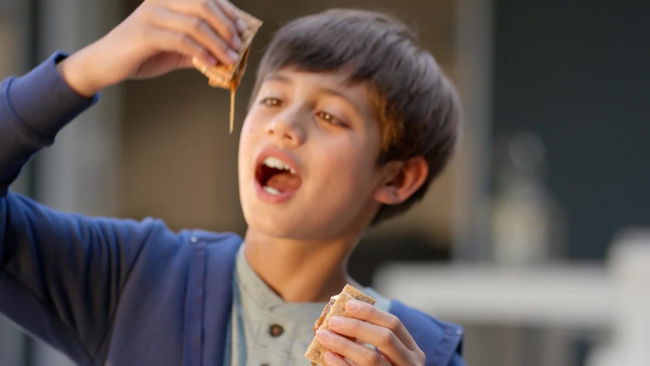 thumbnail video image 2 of GHIRARDELLI White Chocolate SQUARES with Caramel Filling, 8.9 oz Bag, 2 of 7