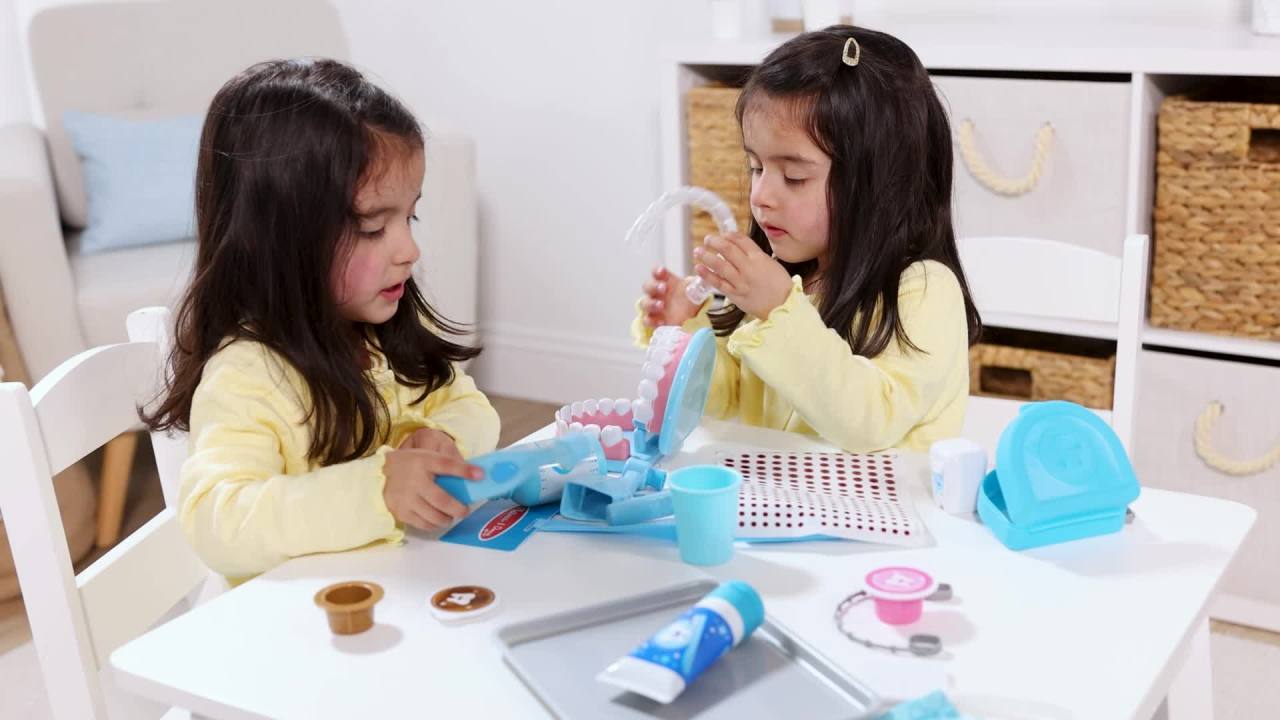 thumbnail video image 3 of Melissa & Doug Super Smile Dentist Kit With Pretend Play Set of Teeth And Dental Accessories (25 Toy Pieces), 3 of 11