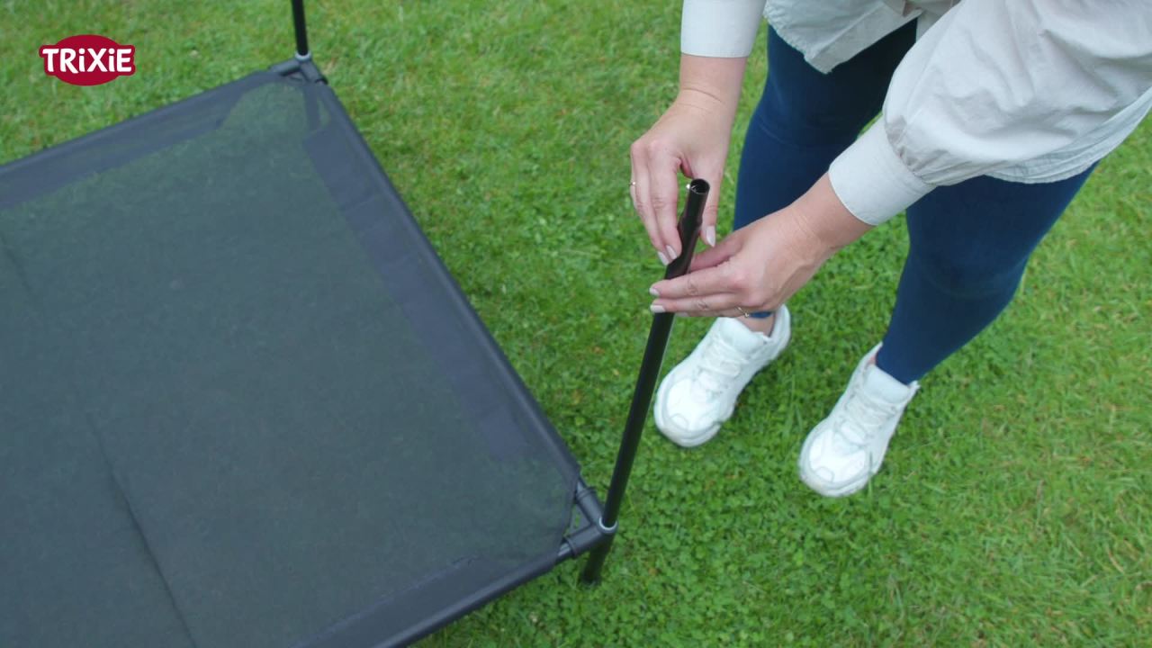 thumbnail video image 2 of TRIXIE 2-in-1 Elevated Portable Dog House or Dog Cot & Tent for Medium-Large Dogs, 2 of 9
