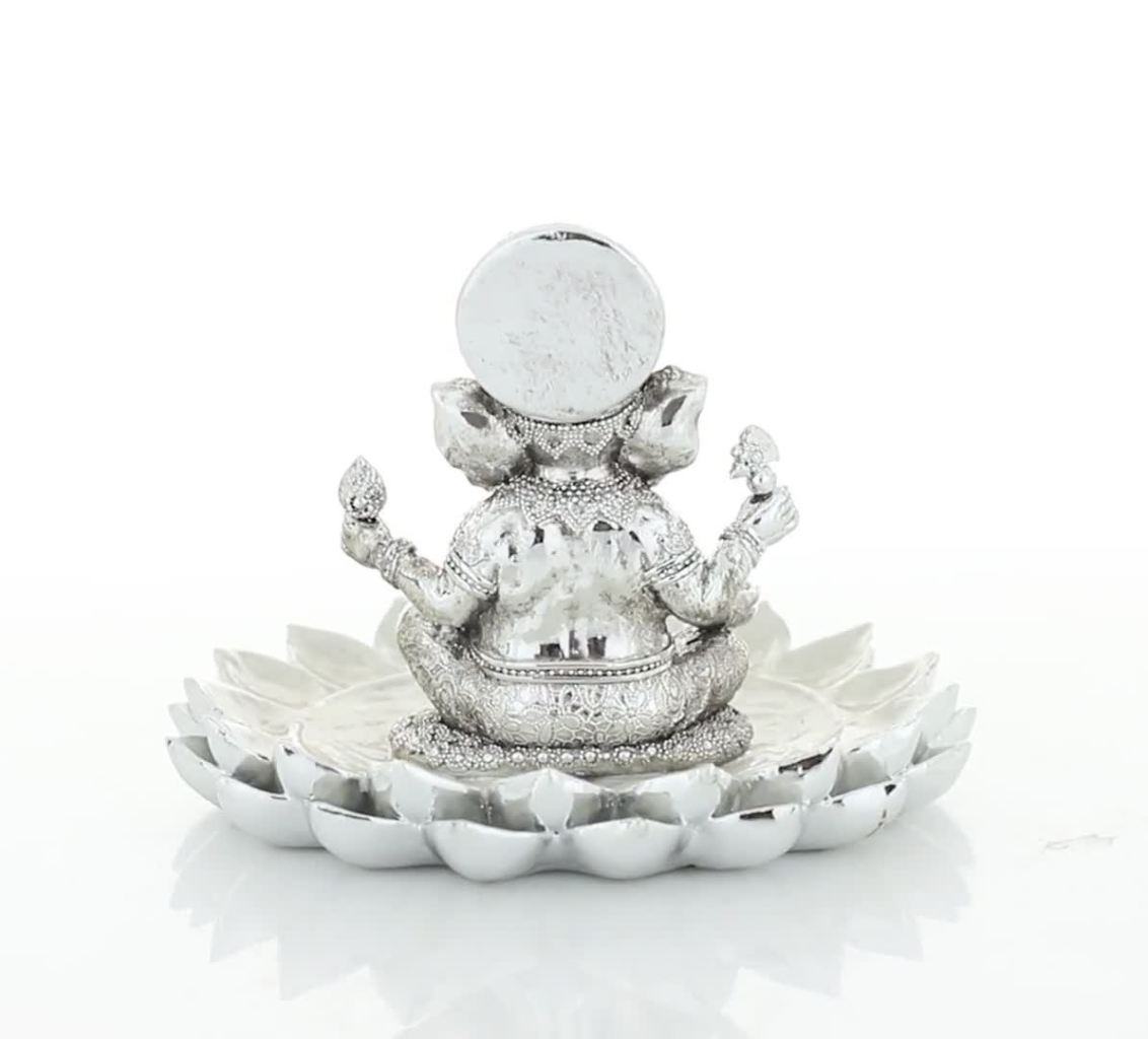 thumbnail video image 2 of DecMode Silver Polystone Eclectic Ganesh Buddha Sculpture Sitting on a Double-Petal Lotus Flower, 10"W x 7" H, 2 of 9