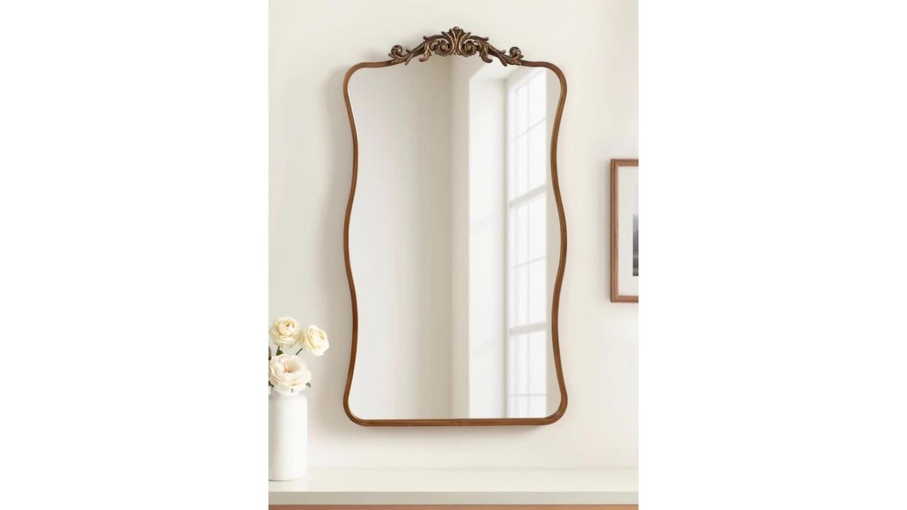 thumbnail video image 2 of Kate and Laurel Arendahl Glam Wavy Arched Panel Mirror, 24 x 42, Gold, Traditional Baroque Scalloped Large Body Wall Mirror with Ornate Garland Inspired Crown, 2 of 9