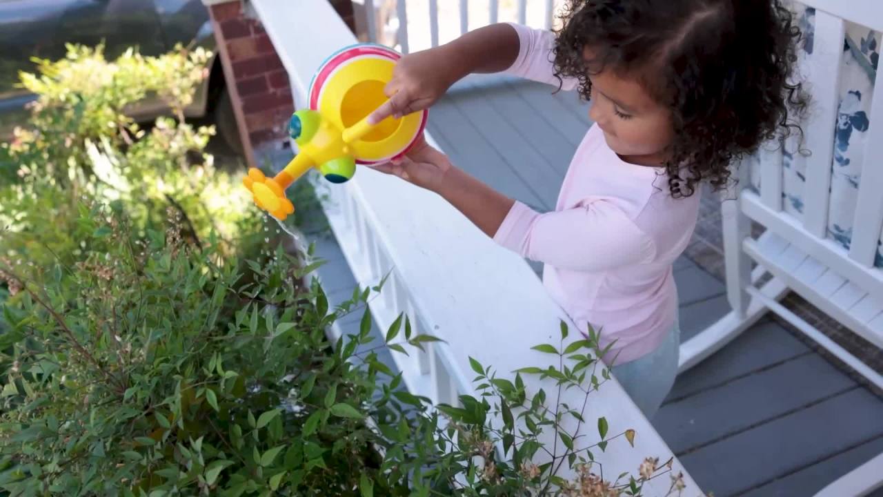 thumbnail video image 2 of Melissa & Doug Sunny Patch Giddy Buggy Watering Can With Flower-Shaped Spout, 2 of 10