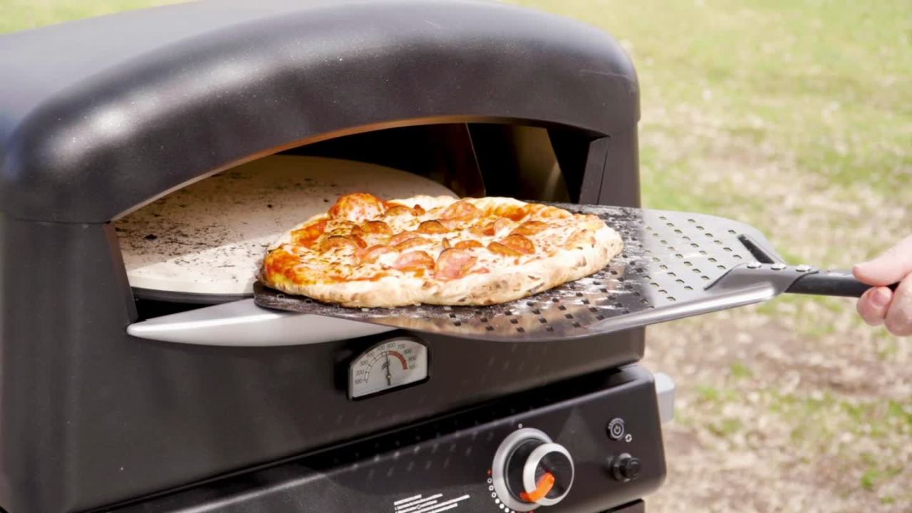 thumbnail video image 2 of Blackstone Perforated Aluminum Pizza Peel with Heat-Resistant Handle in Black, 14" L x 1" W x 18" H, 2 of 8