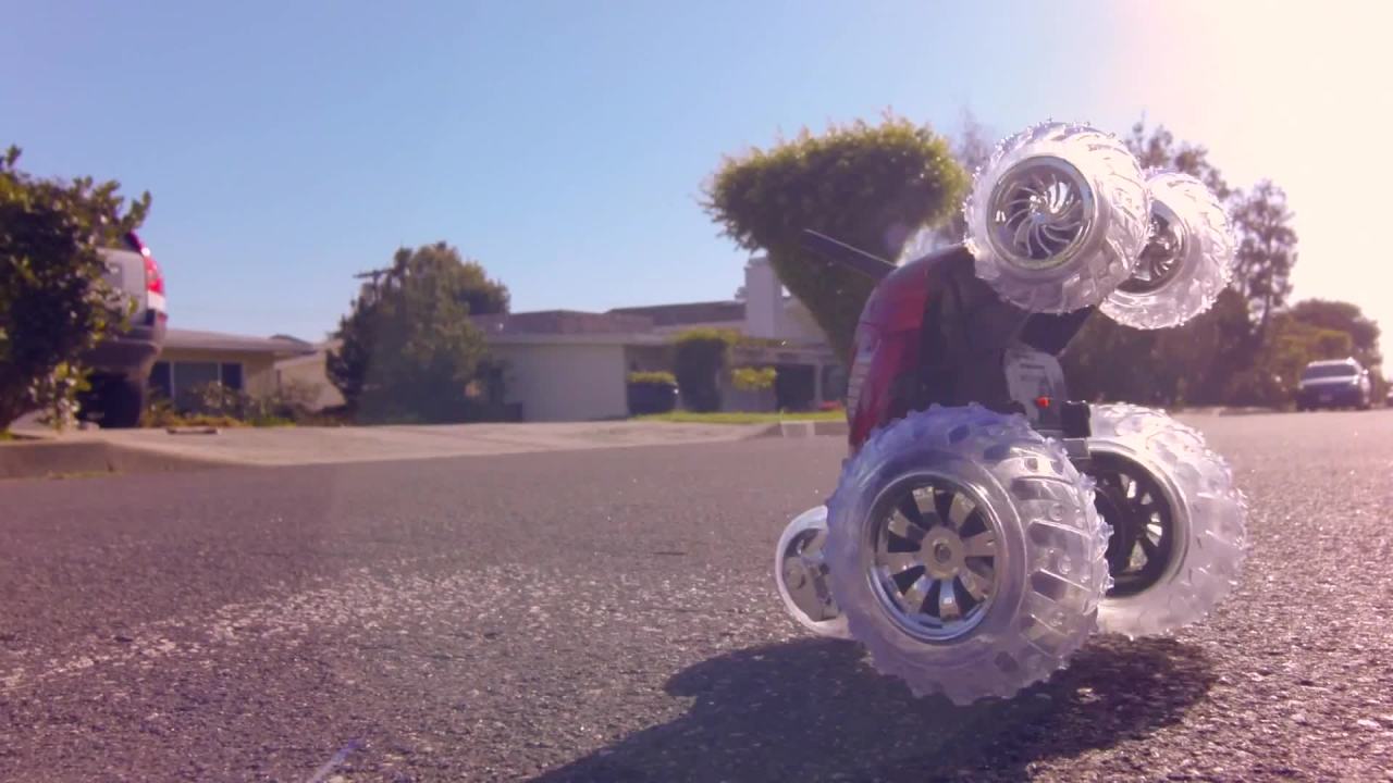 thumbnail video image 2 of SHARPER IMAGE Thunder Tumbler Toy RC Car for Kids, Remote Control Monster Spinning Stunt Mini Truck for Girls and Boys, Racing Flips and Tricks with 5th Wheel, 49 MHz Black, 2 of 14