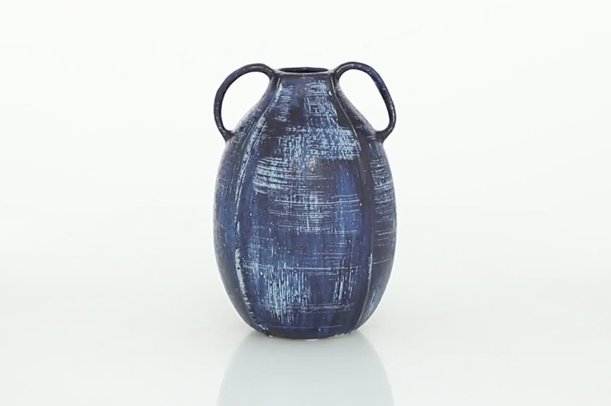thumbnail video image 2 of DecMode 9" Blue Ceramic Vase with Handles, 2 of 9