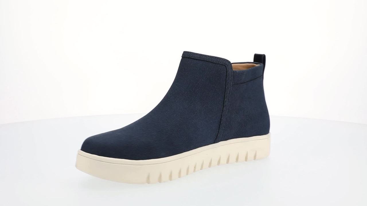 thumbnail video image 2 of Journee Alita Round Toe Outside Zipper Flexible Comfort Ankle Sneaker Bootie, 2 of 9