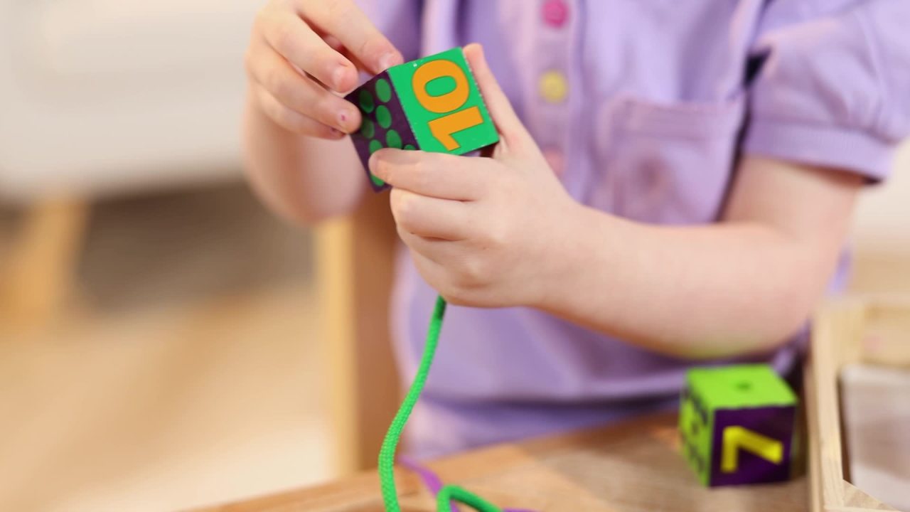 thumbnail video image 2 of Melissa & Doug Deluxe Wooden Lacing Beads - Educational Activity With 27 Beads and 2 Laces, 2 of 10