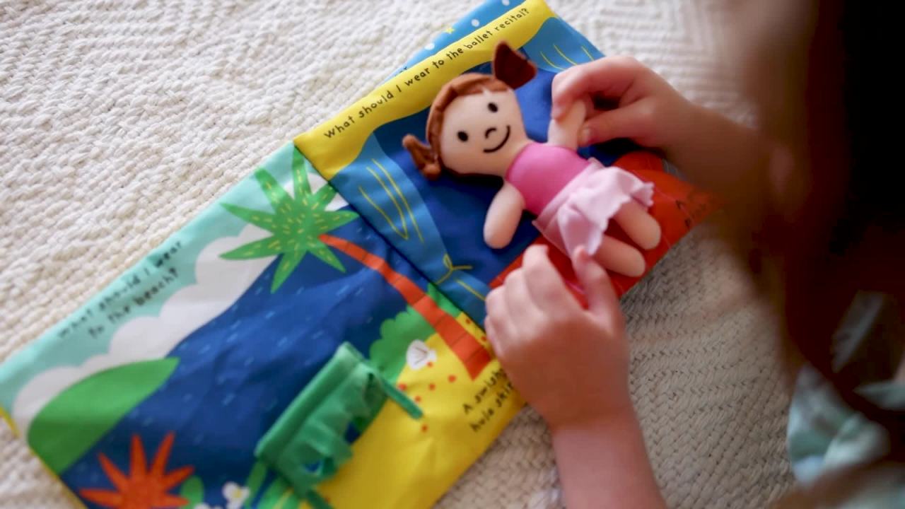 thumbnail video image 2 of Melissa & Doug Soft Activity Baby Book - What Should I Wear?, 2 of 10