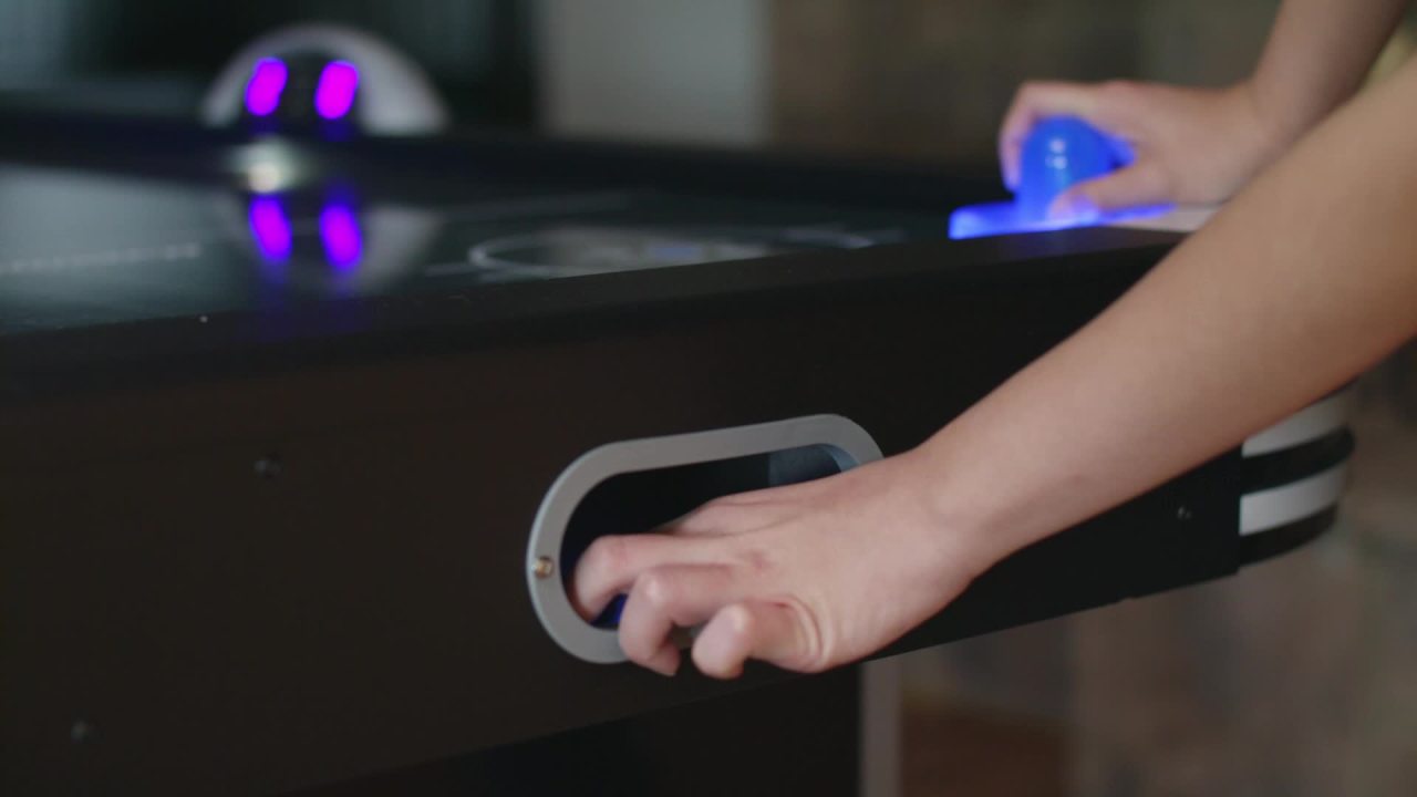 thumbnail video image 2 of Triumph Lumen-X Lazer 6' Interactive Air Hockey Table Featuring All-Rail LED Lighting and In-Game Music, 2 of 14