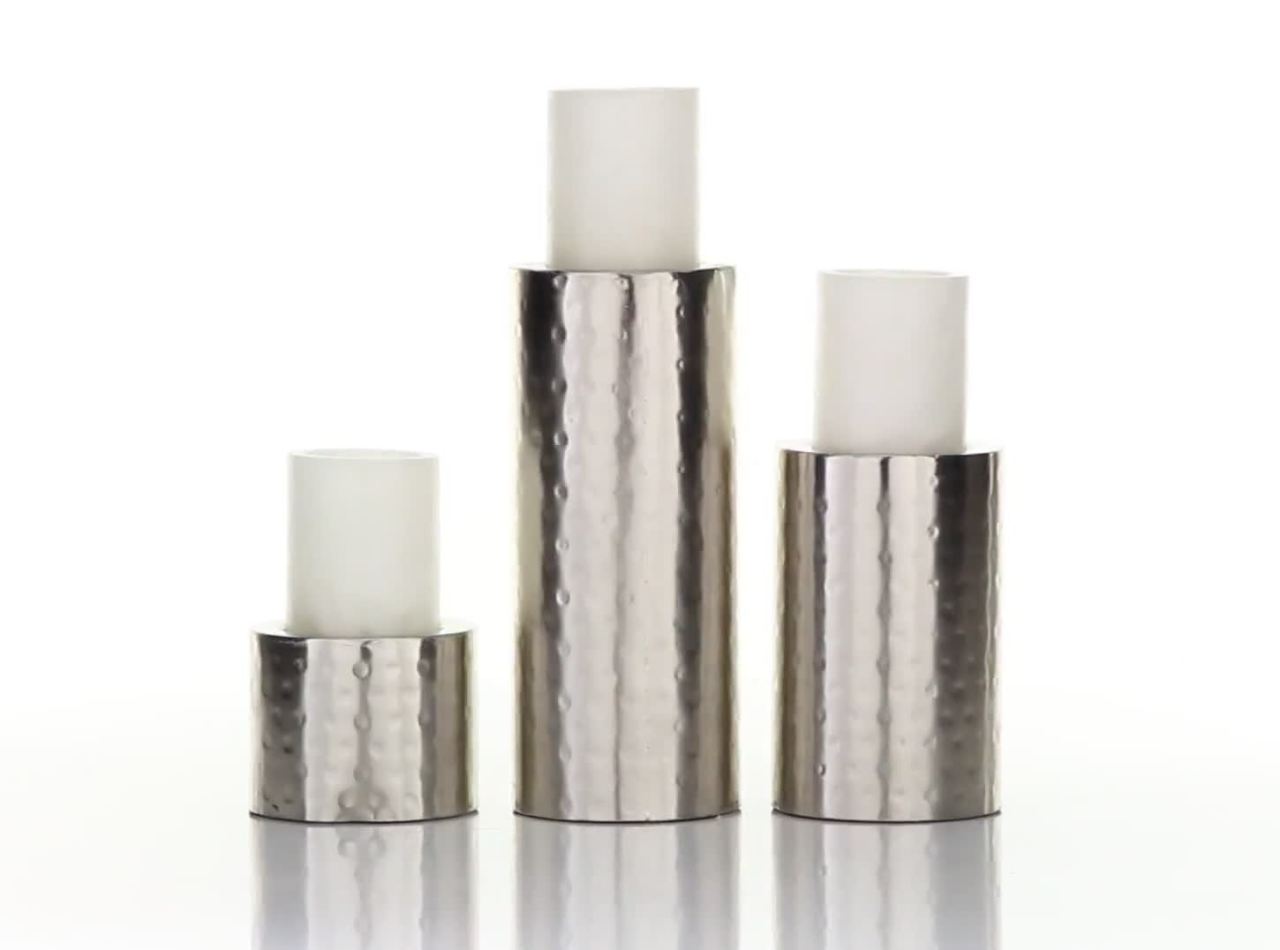 thumbnail video image 2 of CosmoLiving by Cosmopolitan 3 Candle Silver Metal Handmade Pillar Candle Holder, Set of 3, 2 of 11