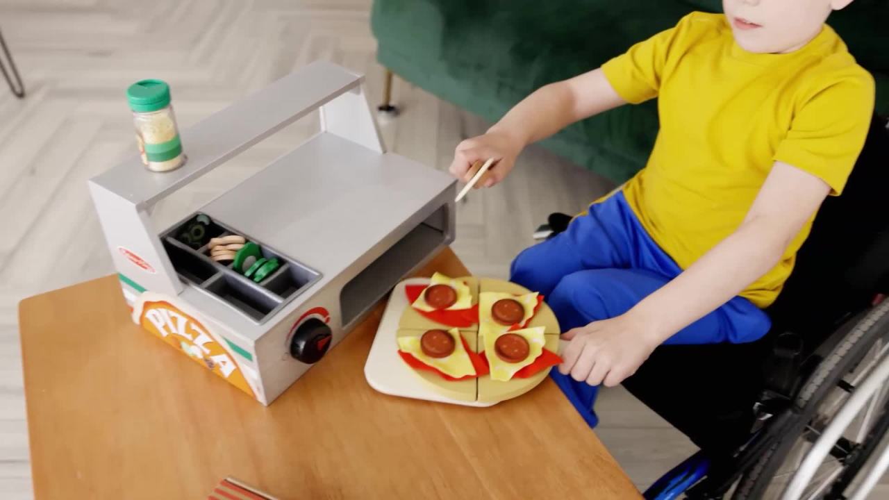 thumbnail video image 3 of Melissa & Doug Top & Bake Wooden Pizza Counter Play Set (41 Pcs) - FSC Certified, 3 of 11