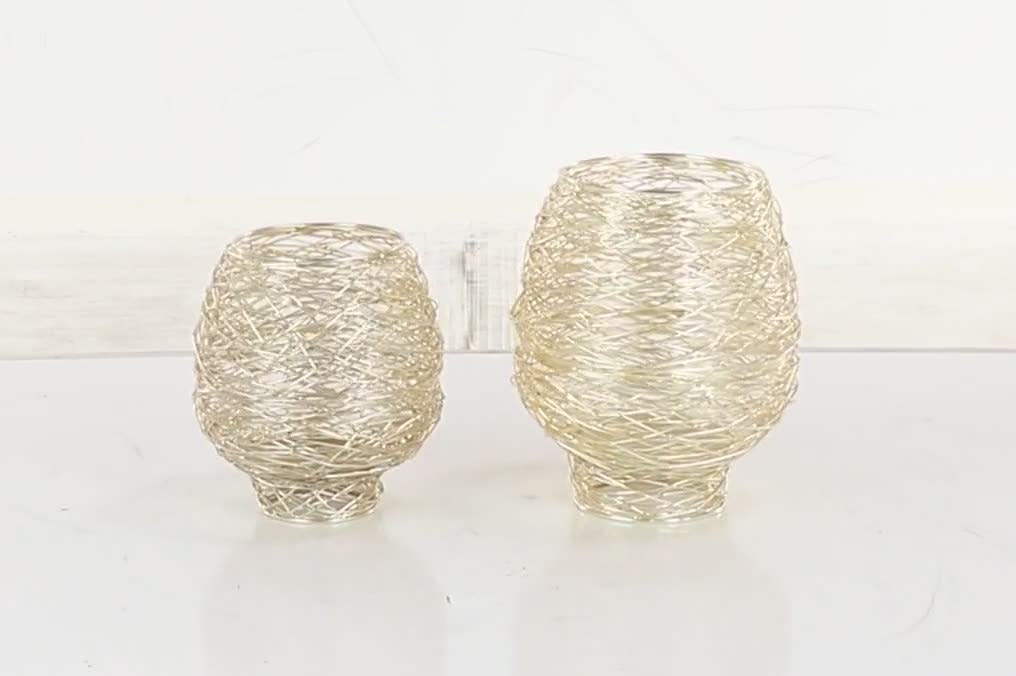 thumbnail video image 2 of CosmoLiving by Cosmopolitan 2 Holder Gold Metal Tealight Decorative Candle Lantern, Set of 2, 2 of 9