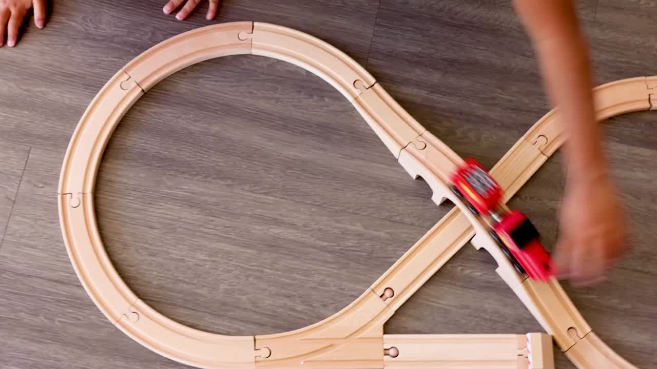 thumbnail video image 2 of Melissa & Doug Classic Wooden Figure Eight Train Set (22 pcs), 2 of 4