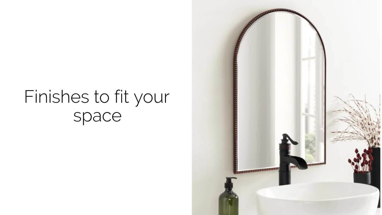 thumbnail video image 2 of Kate and Laurel Gwendolyn Antique Beaded Arch Wall Mirror, 20 x 30, Bronze, Sophisticated Vintage Bathroom Mirror Wall Decor with Detailed, Beaded Frame, 2 of 9