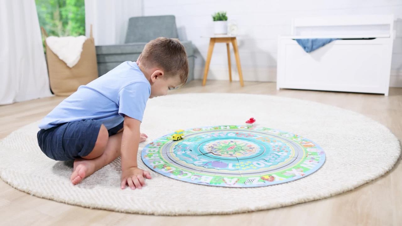 thumbnail video image 3 of Melissa & Doug Round the Shore Tracks Cardboard Jigsaw Floor Puzzle and Wind-Up Vehicles – 48 Pieces, for Boys and Girls 4+ - FSC Certified, 3 of 12