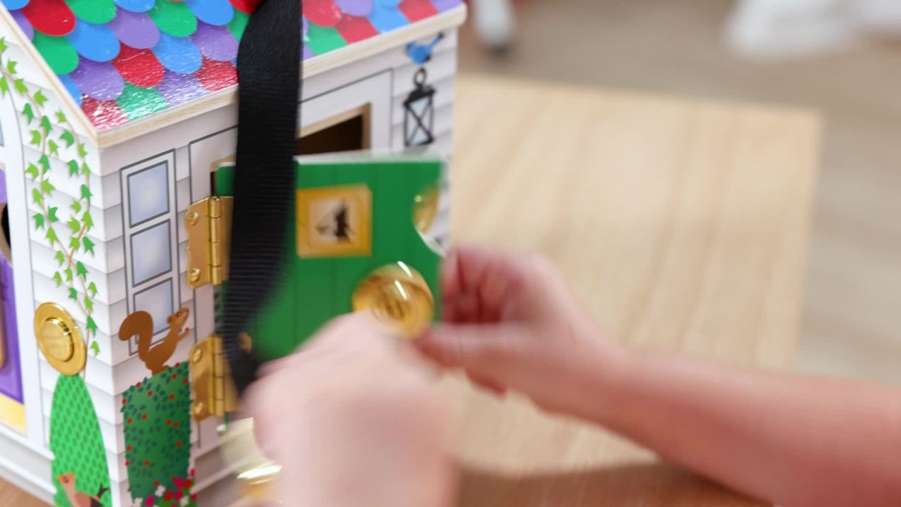 thumbnail video image 2 of Melissa & Doug Take-Along Wooden Doorbell Dollhouse - Doorbell Sounds, Keys, 4 Poseable Wooden Dolls, 2 of 10