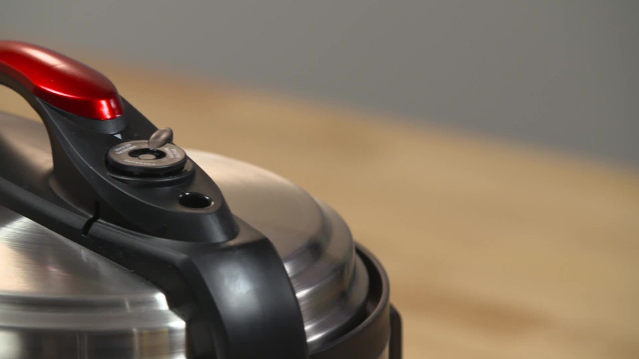 thumbnail video image 2 of Imusa 5Qt Electric Stainless Steel Red Bilingual Digital Pressure Cooker, 2 of 12