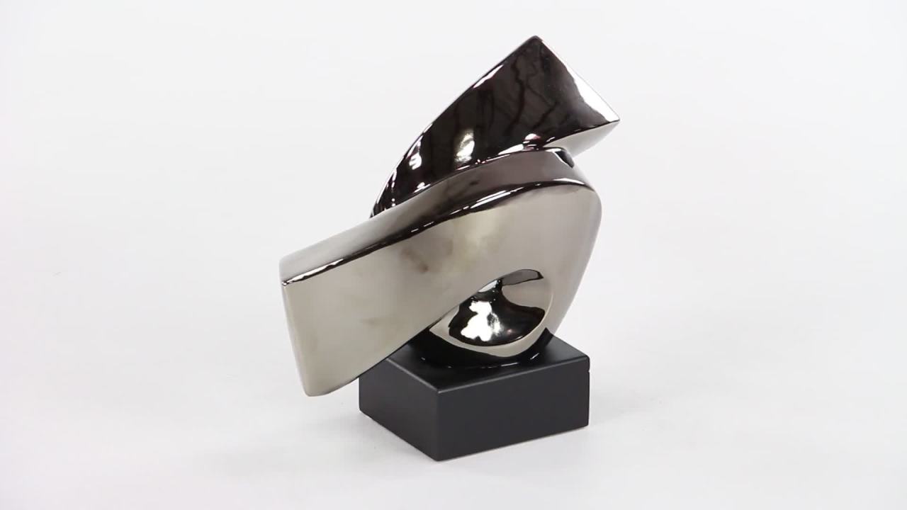 thumbnail video image 2 of DecMode Ceramic Modern Twisted Sculpture, Silver, 2 of 8