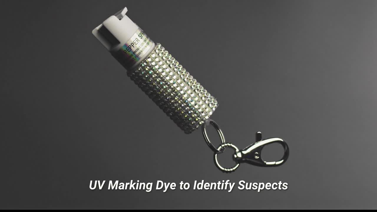 thumbnail video image 2 of SABRE Pepper Spray with Snap Clip, Jeweled Monochromatic Design, Pink, 2 of 9