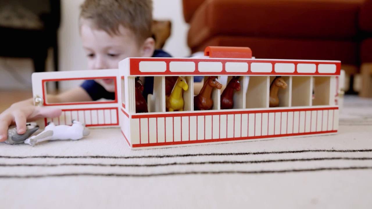 thumbnail video image 2 of Melissa & Doug Take-Along Show-Horse Stable Play Set With Wooden Stable Box and 8 Toy Horses, 2 of 10