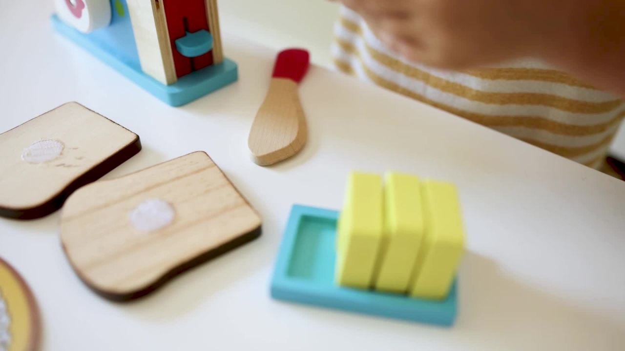 thumbnail video image 2 of Melissa & Doug Bread and Butter Toaster Set (9 pcs) - Wooden Play Food and Kitchen Accessories, 2 of 10