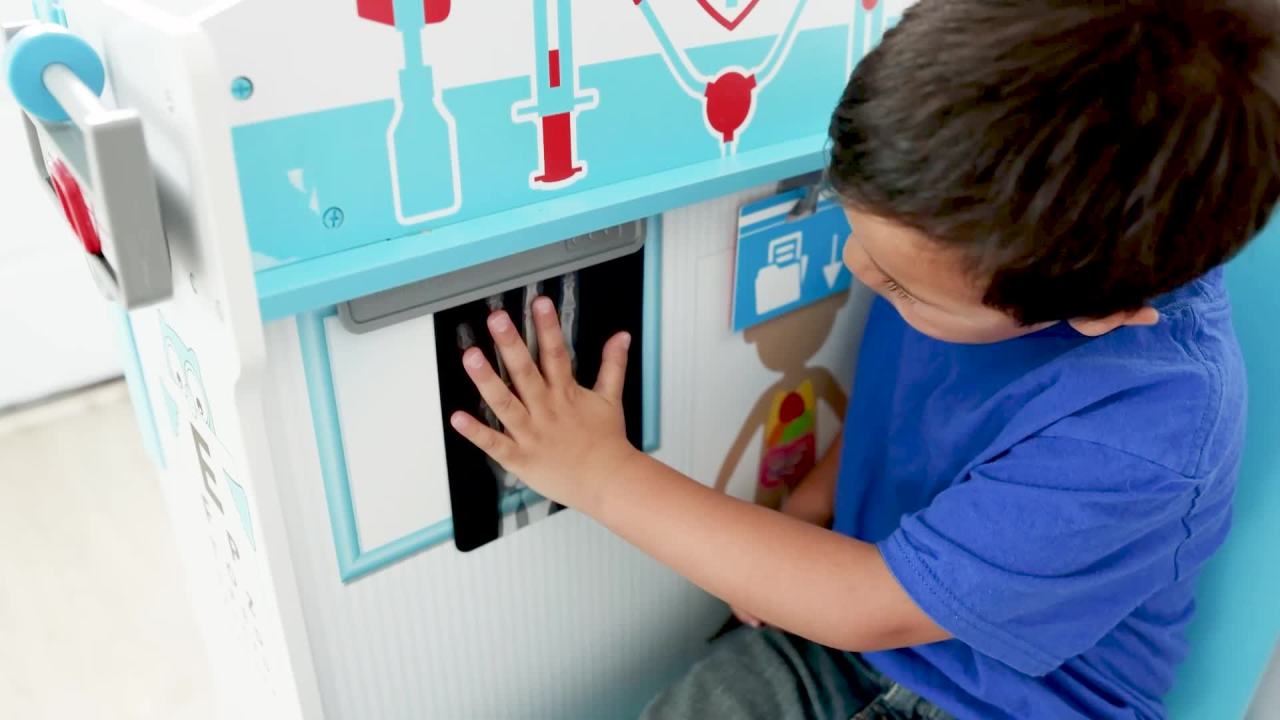 thumbnail video image 3 of Melissa & Doug Wooden Get Well Doctor Activity Center - Waiting Room, Exam Room, Check-In Area - FSC Certified, 3 of 11