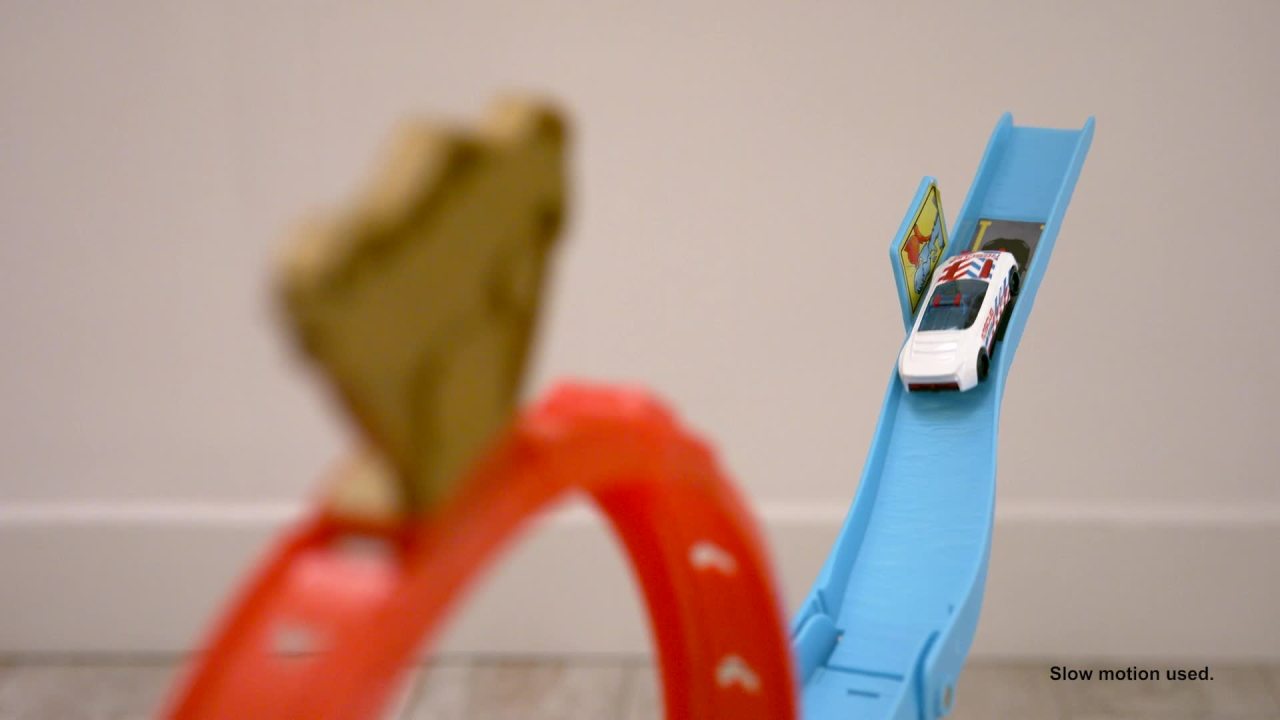 thumbnail video image 2 of Hot Wheels City T-Rex Loop and Stunt Playset, Track Set with 1 Toy Car, 2 of 7