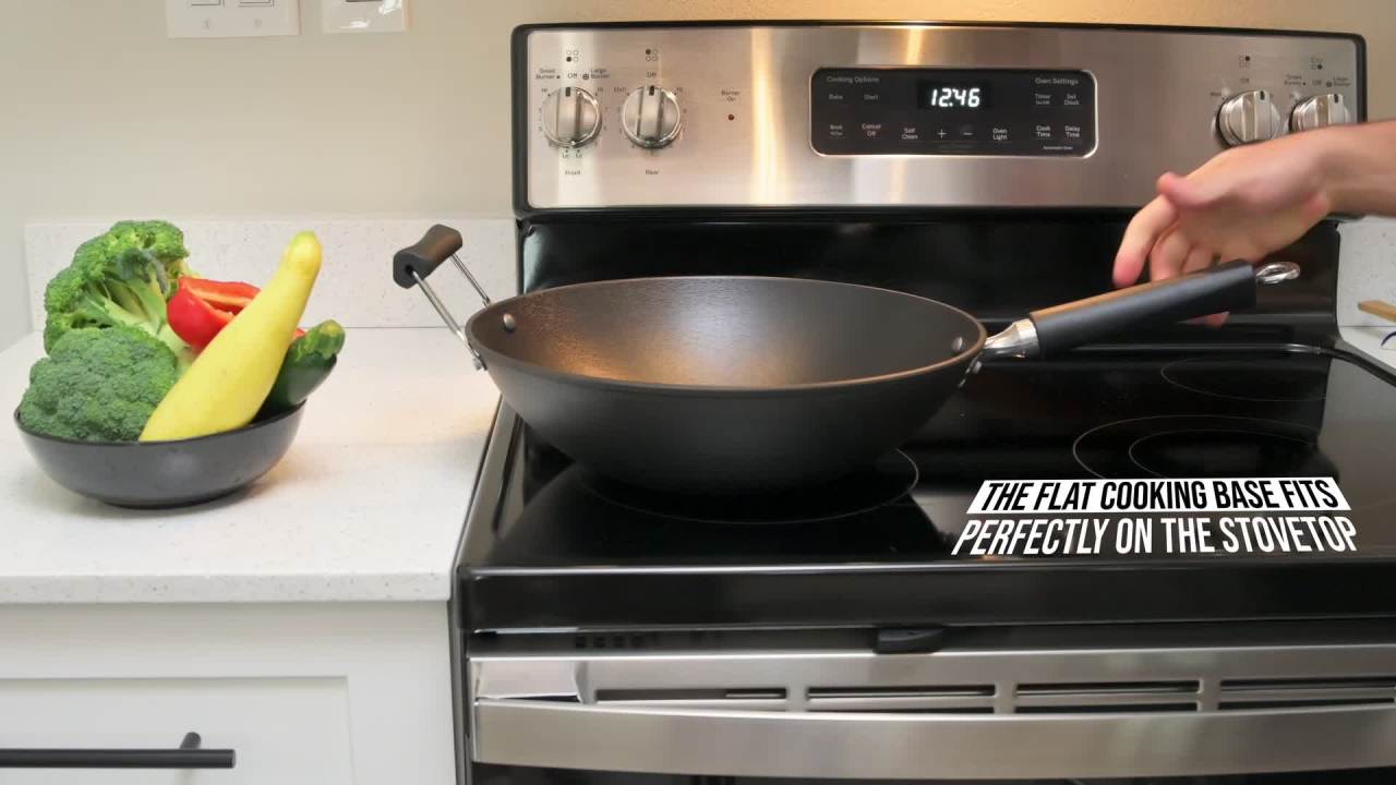 thumbnail video image 3 of IMUSA 14in Light Cast Iron Preseasoned Wok with Cool Touch Handles, 3 of 9