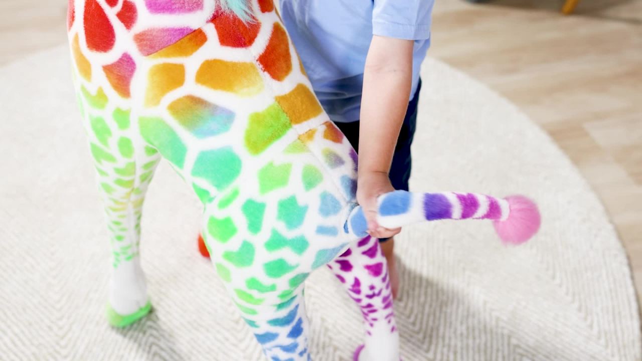 thumbnail video image 3 of Melissa & Doug Rainbow Giraffe Lifelike Plush, 3 of 11
