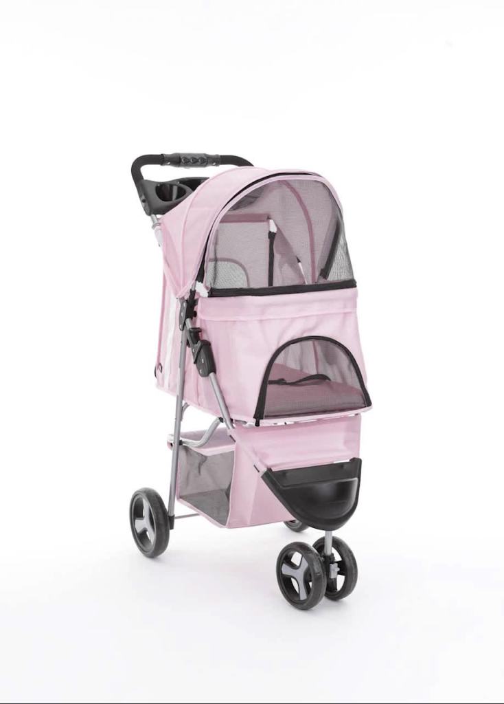thumbnail video image 2 of TRIXIE 3-Wheeled Foldable Dog & Cat Stroller with Canopy and Storage Compartments, Pink, 2 of 9